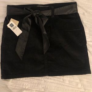 Velvet black mini skirt with satin belt